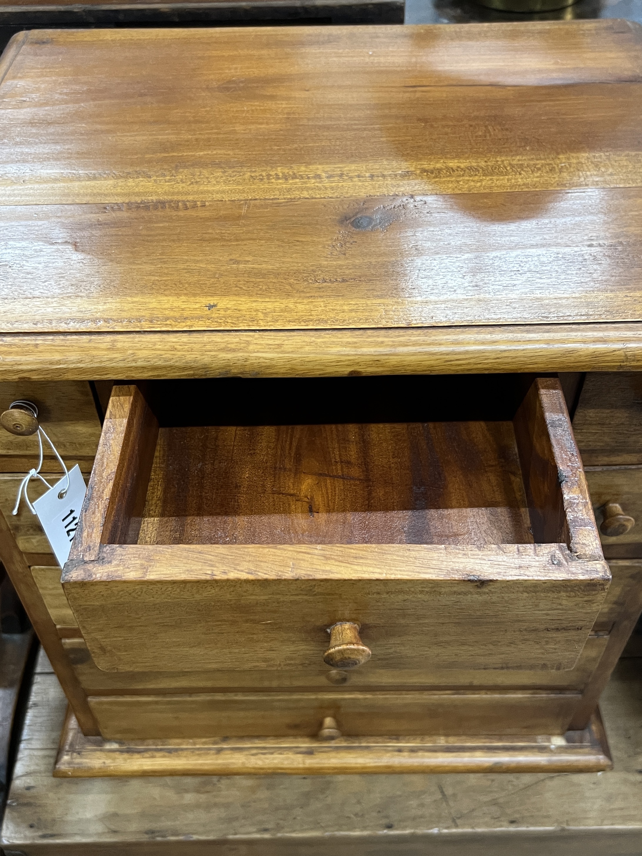 A small Victorian pine trunk, width 66cm, depth 44cm, height 47cm and a modern hardwood drawer unit